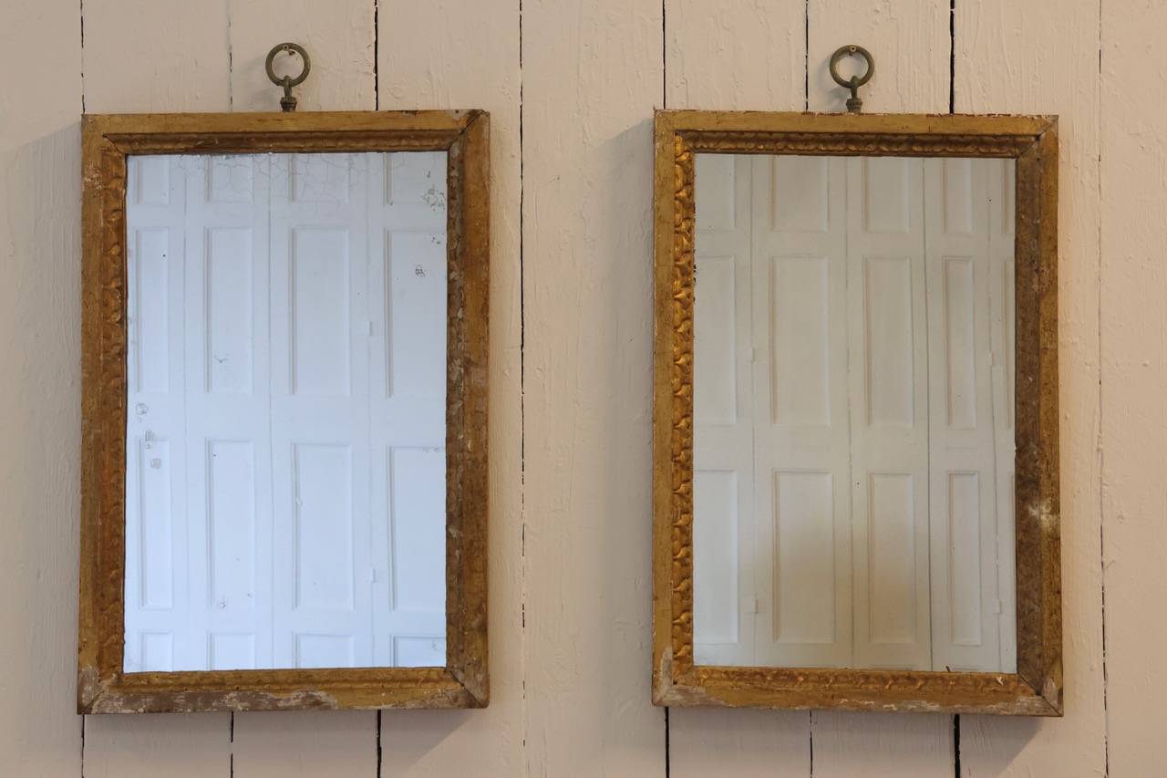 Pair of Early 19th Century Italian Distressed Giltwood Mirrors